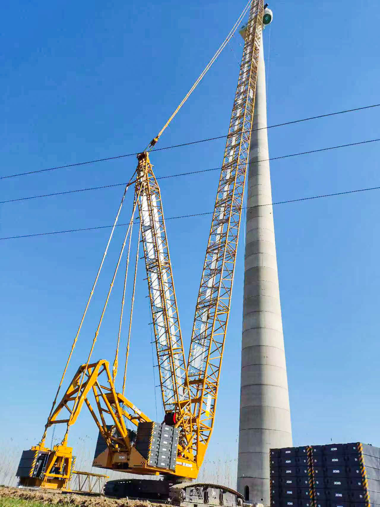 160米高空精准“搭积木”：88858cc永利XLC15000M分体吊装6.25兆瓦风机全纪录